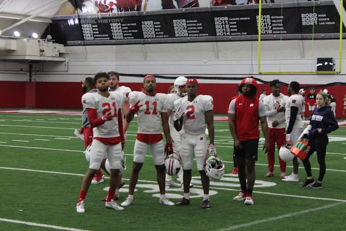 The Wisconsin cornerbacks posing for a picture during a break time.